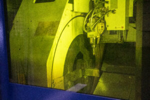 Inside Of Tube Laser Through Yellow Glass